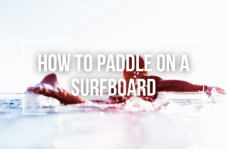 how to paddle on a surfboard
